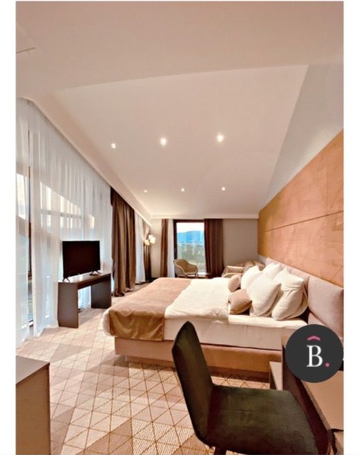 An elegantly designed guest room at Emporia, with a view toward the vineyards